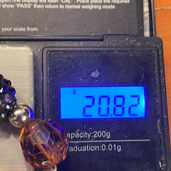 8” stackable stretch bracelet with 8 amber color & 9 silver tone beads - Picture 13 of 13